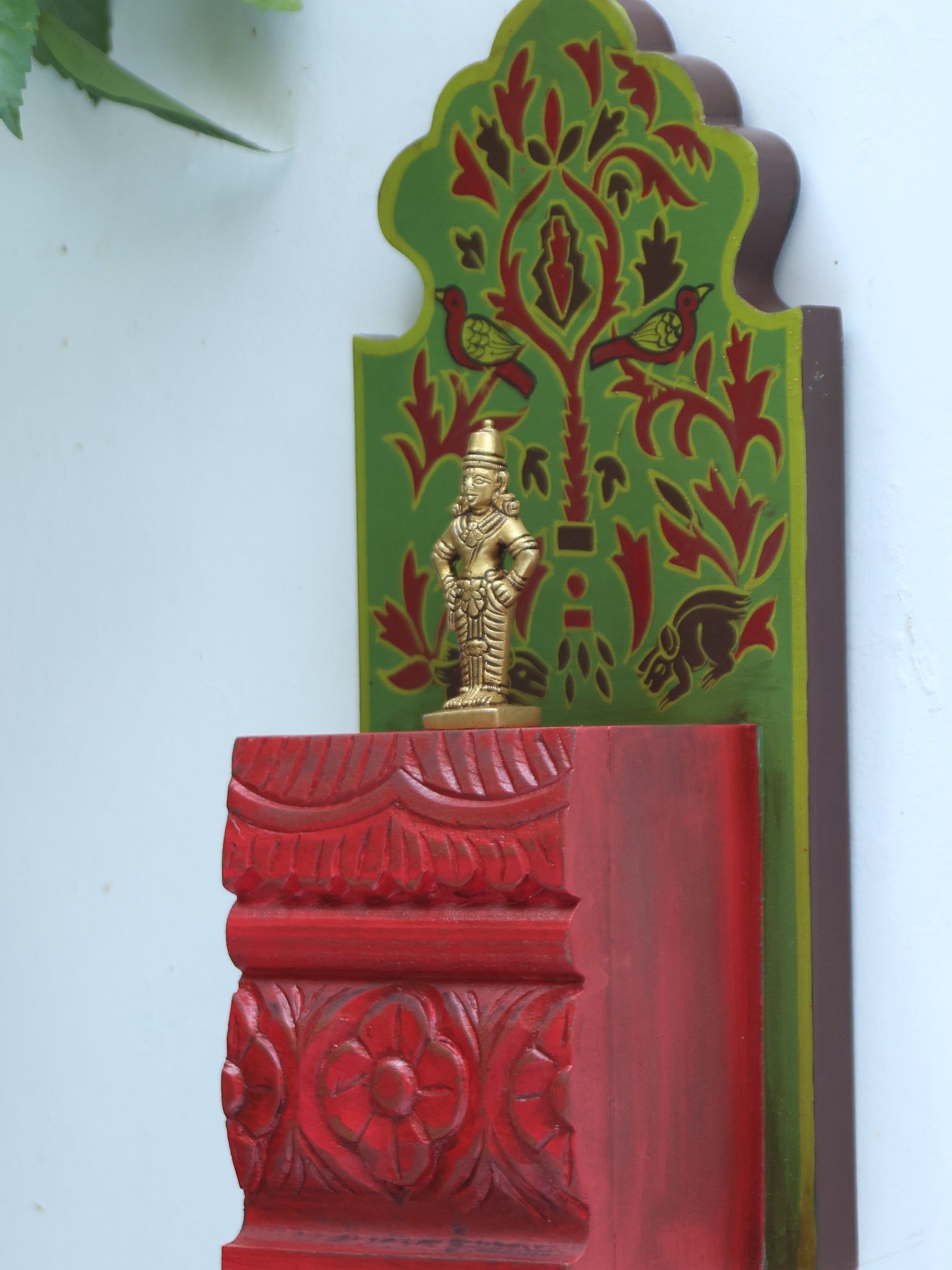The Artistry of Red and Green Hand-Painted, Hand-Carved Corbels